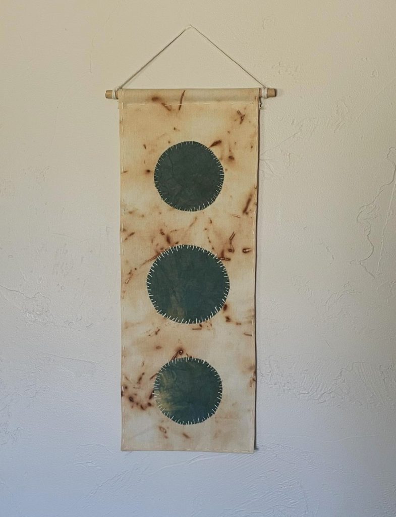 indigo and rust wall hanging