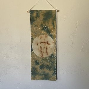 indigo and rust wall hanging