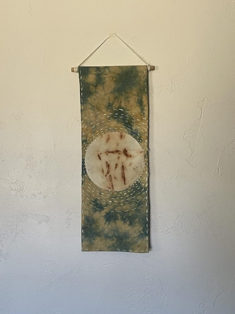 indigo and rust wall hanging